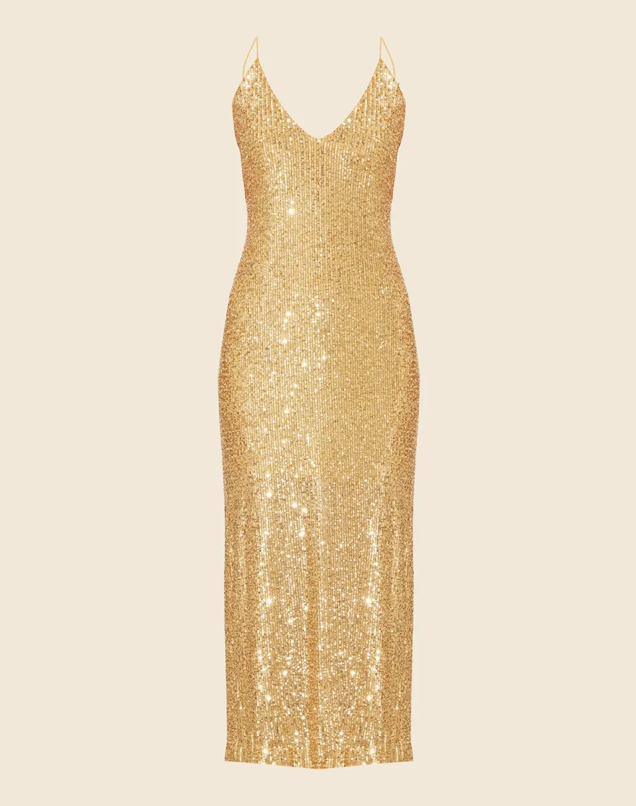 Vestido Paetê Freedom com forro curto, decote V na frente e nas costas com alcinhas finas.<BR>Possui zíper invisível para fechamento lateral e abertura nas laterais abaixo do joelho.<BR>