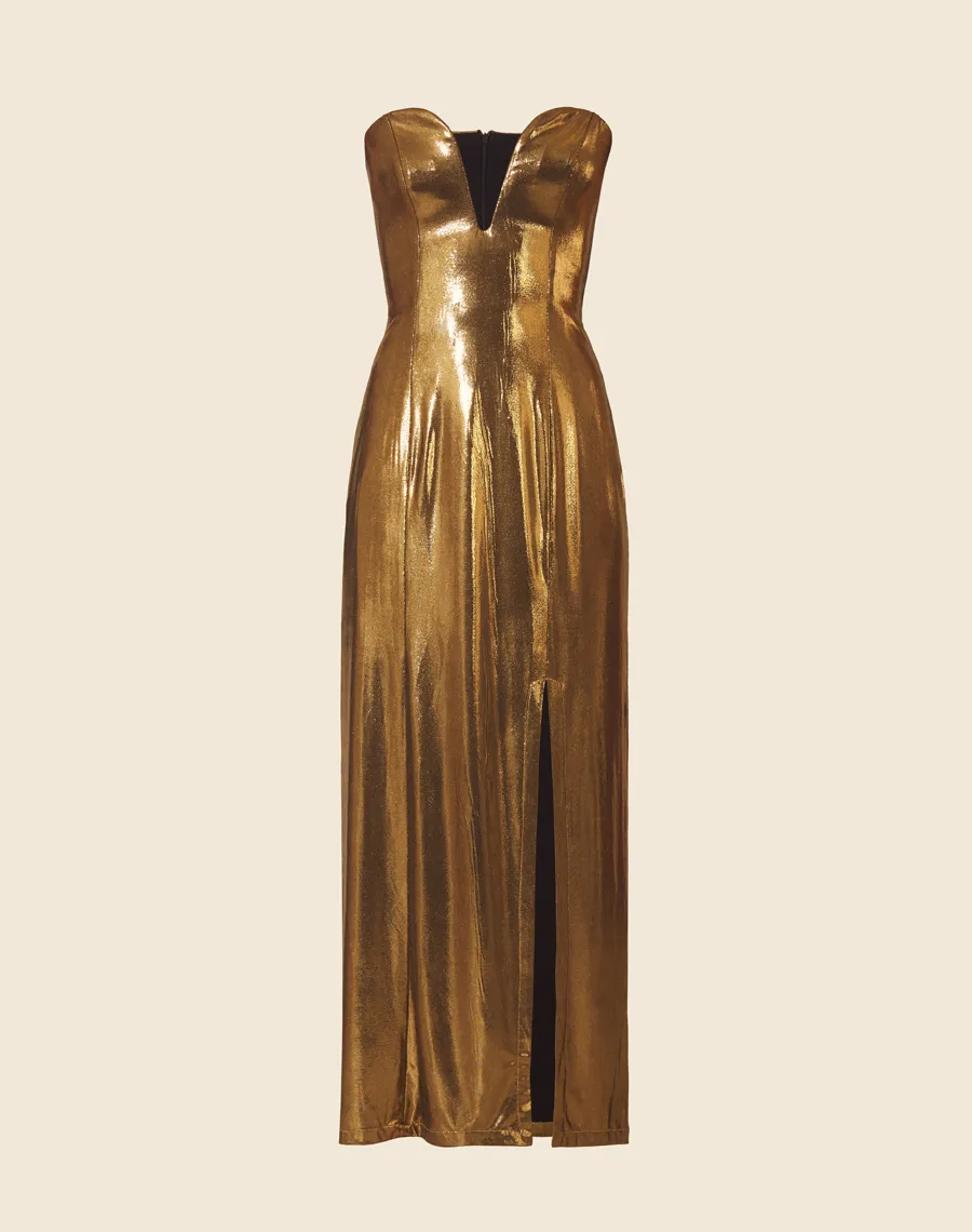 Vestido Lamê Lucy possui decote profundo de coração com sustentação interna, forro curto com fenda lateral e alças finas, que podem ou não ficar à mostra. Seu fechamento é por zíper invisível posterior.<br/>
