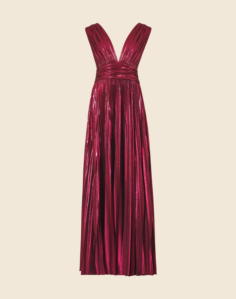 Vestido Leticia confeccionado em Malha Foil, com decote V profundo e costas abertas. Vestido acinturado, com acabamento plissado. <br/>
Fechamento lateral por zíper invisível. <br/>>