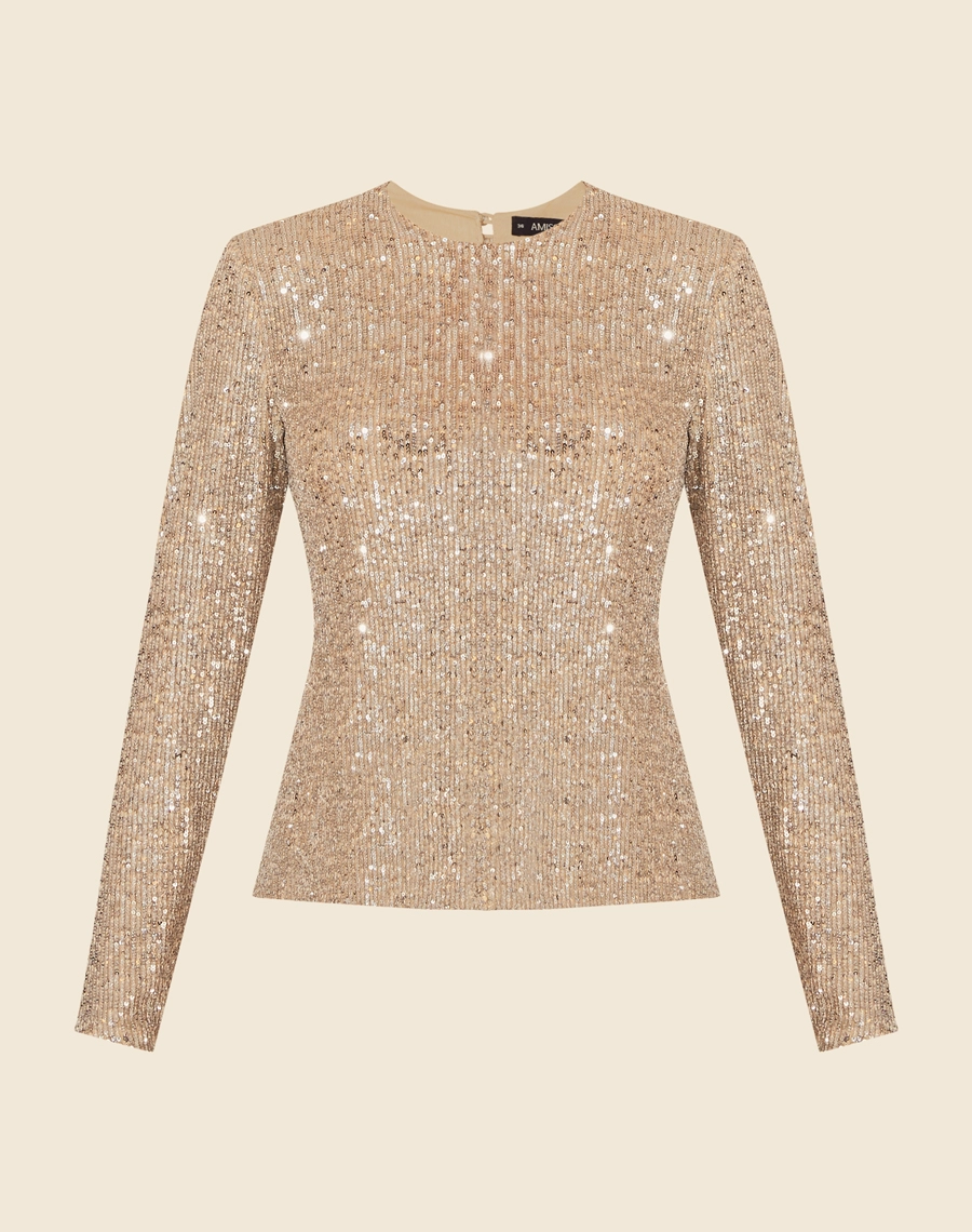 Blusa Cristal é confeccionada em paetê redondo de alta qualidade, com forro interno para garantir conforto durante todo o uso.