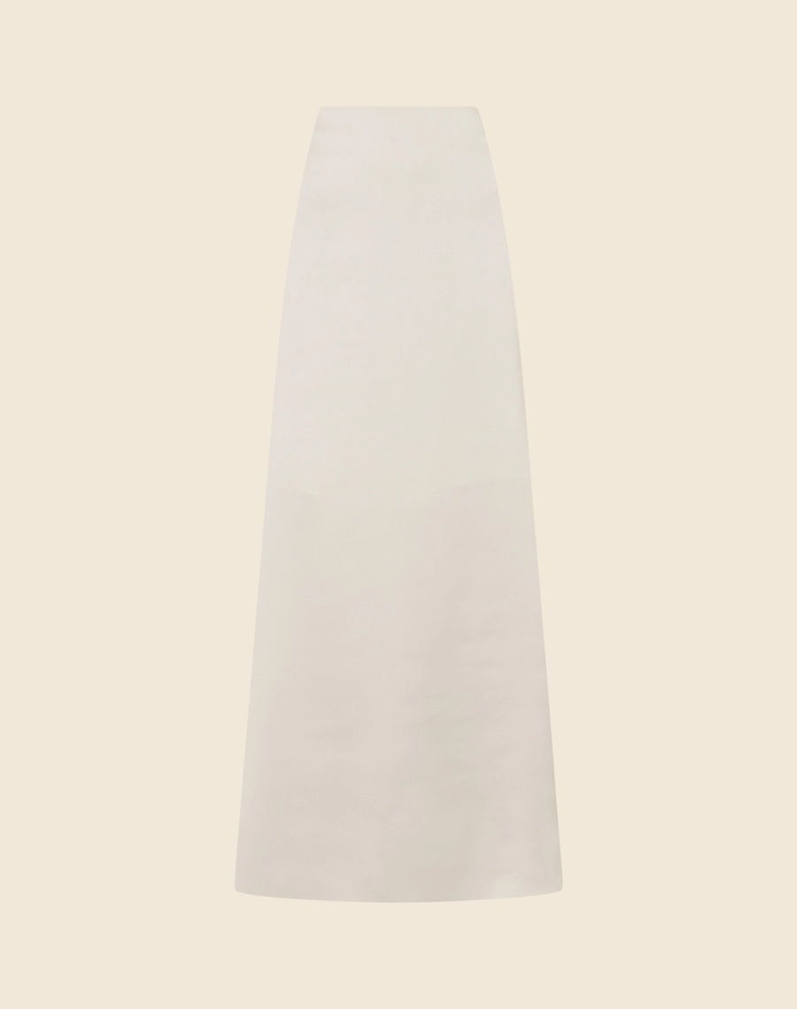 Saia Longa Teresa confeccionado em Cetim.<br/> 
Tecido com toque macio com acabamento brilhoso.<br/>
Comprimento longo com modelagem reta.<br/>
