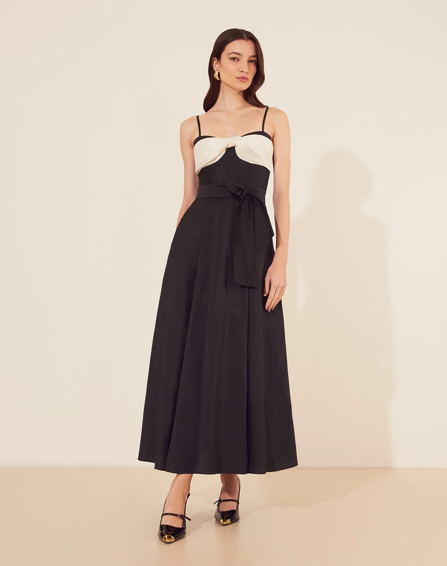 Vestido Midi Jimena confeccionado em tafetá, um tecido acetinado e de leve estrutura. 