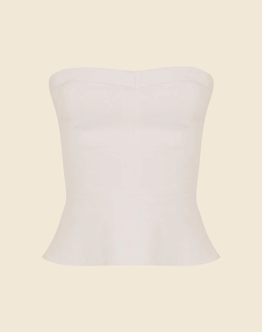 Top Madelyn confeccionado em Linho Misto. <br/>
Peça tomara sem alças com decote coração, feita com modelagem mais justa. <br/>
Fechamento por zíper posterior. <br/>