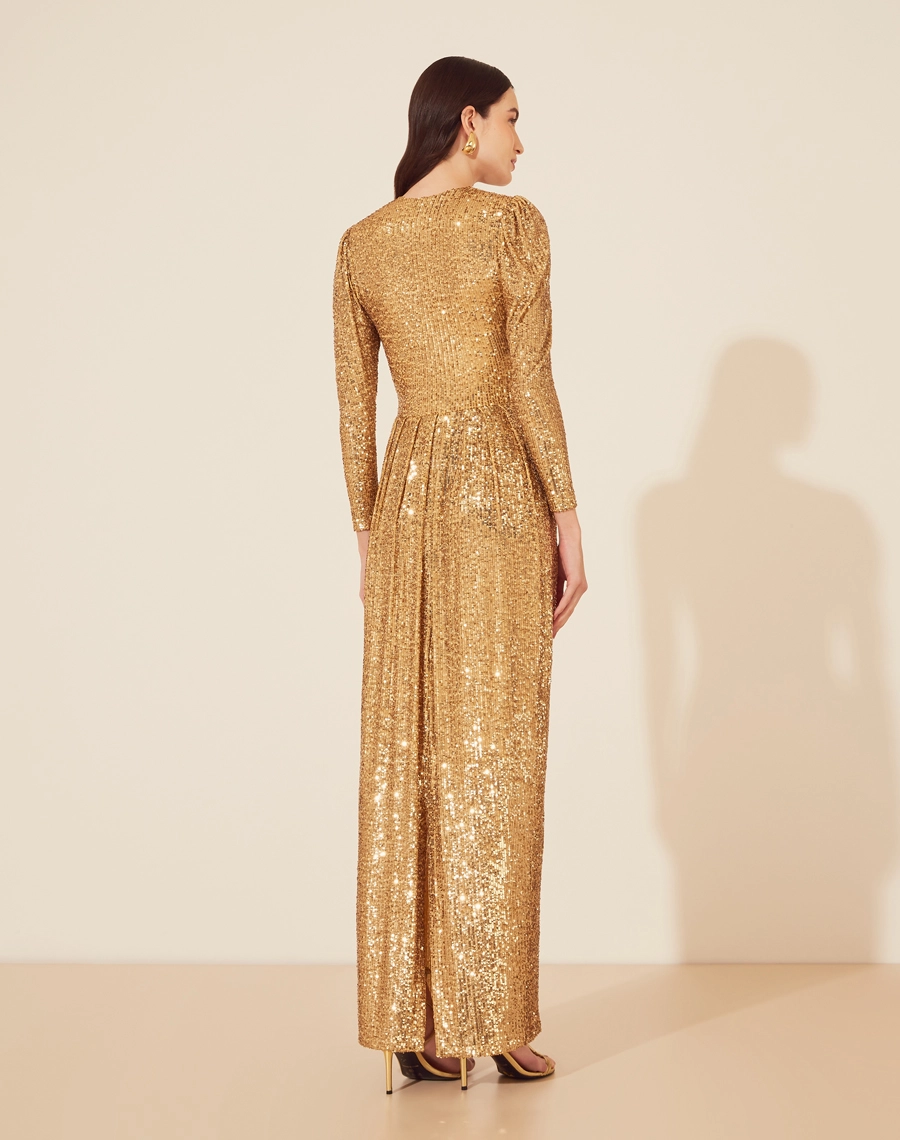 Vestido Longo Bella é uma peça deslumbrante, confeccionada em paetê que garante um brilho espetacular em qualquer evento. 