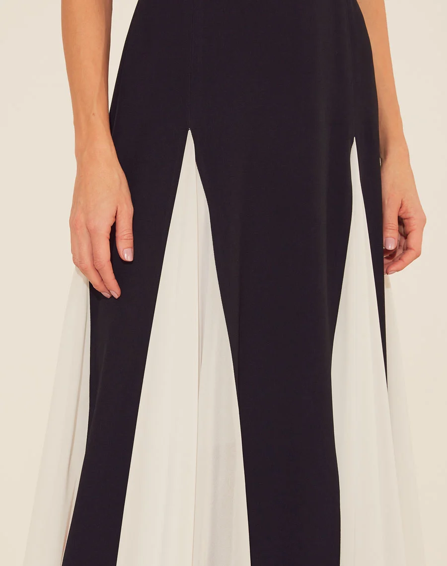 Vestido Longo La Fontonne é a combinação perfeita de elegância e fluidez. Com seu design minimalista e ao mesmo tempo impactante, este vestido é uma escolha atemporal e versátil. 