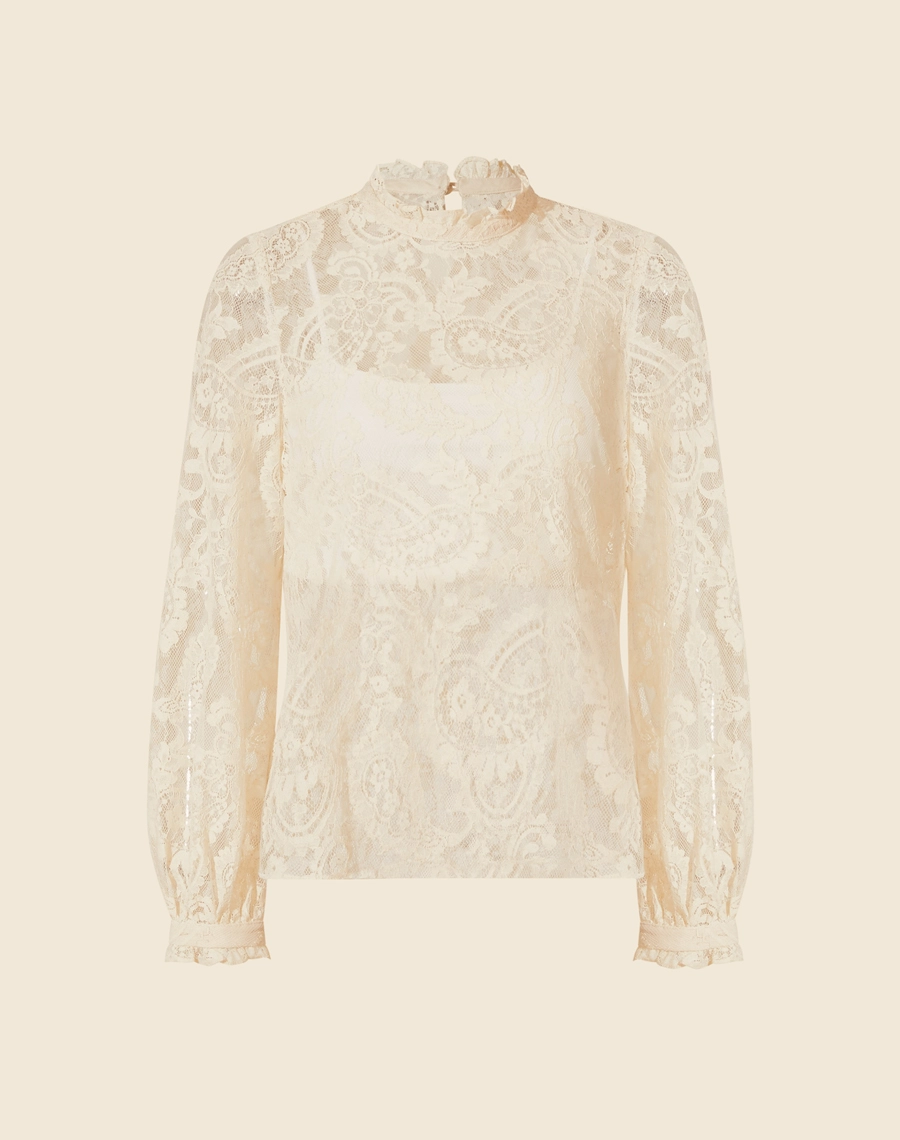 Blusa Belle Epoque é confeccionada em Renda delicada, trazendo uma estética romântica e atemporal. Com mangas longas e gola alta, o modelo é perfeito para compor looks elegantes e sofisticados.