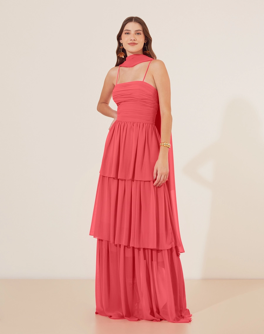 Vestido Longo Leopolda confeccionado em chiffon, garantindo leveza e movimento a cada passo. Suas cores vibrantes tornam a peça  indispensável em festas de verão.