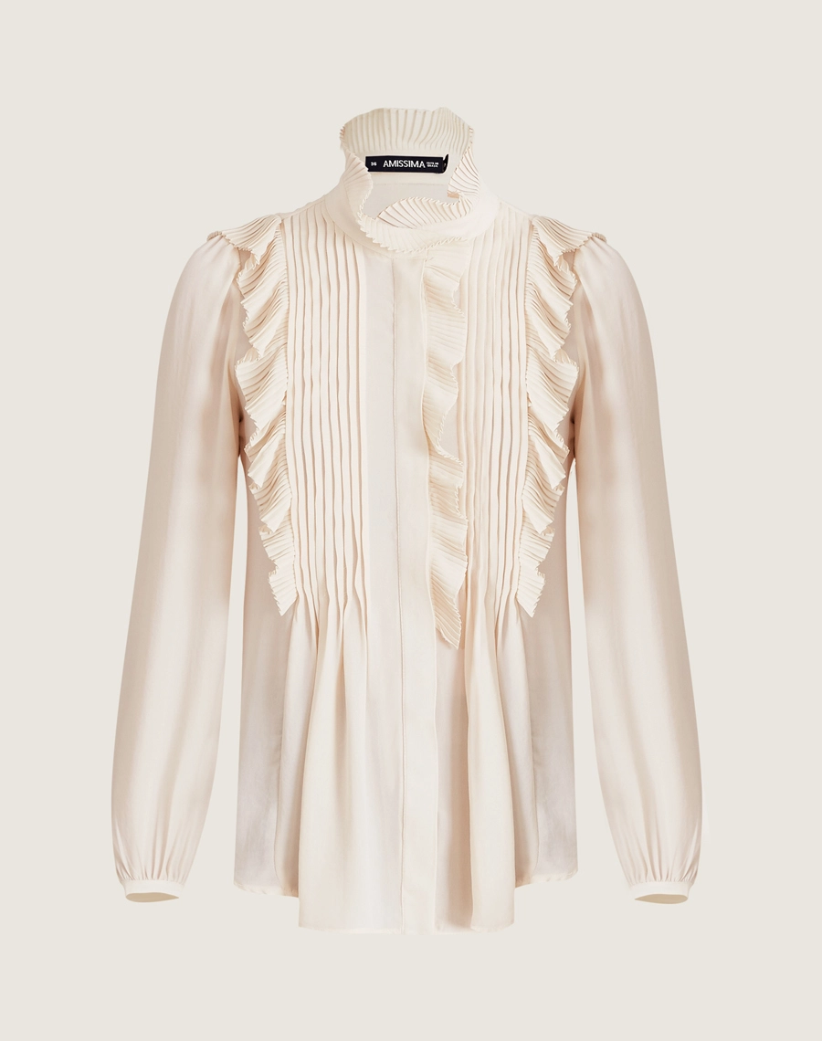 Blusa Aline, confeccionada em crepinho, tecido leve, fluido e delicado, com toque macio e caimento elegante.