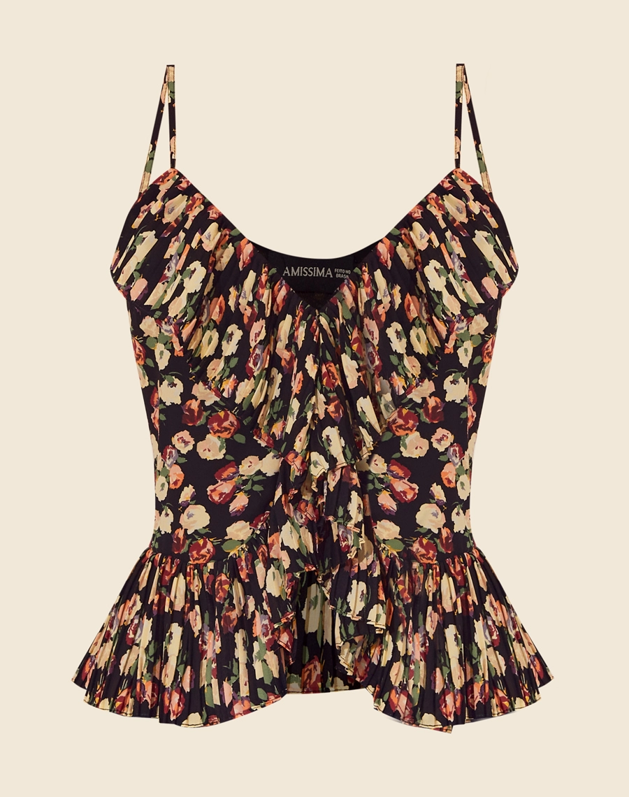 O Top Clarice é confeccionado em crepinho estampado. Com sua estampa floral exclusiva, pode ser usado tanto no dia a dia, quanto em produções mais sofisticadas para ocasiões especiais, como jantares românticos ou eventos noturnos.