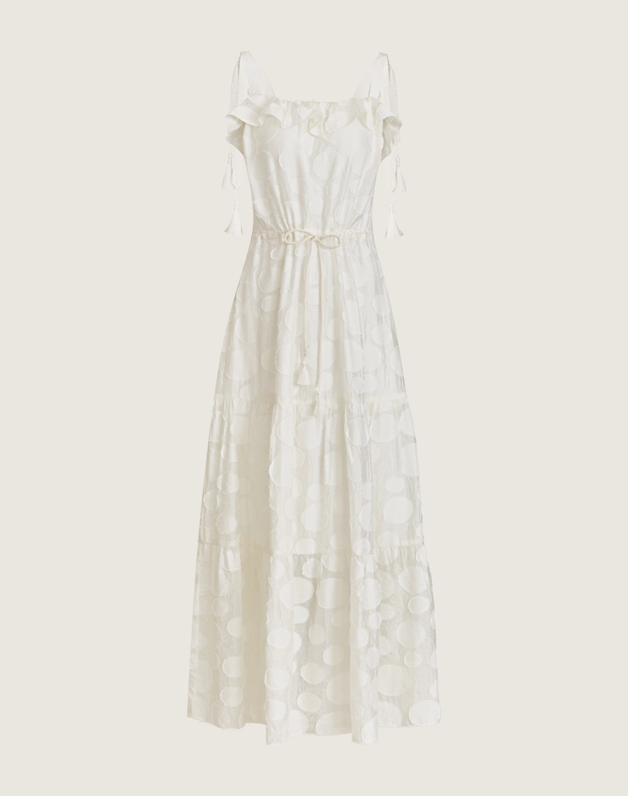 O Vestido Longo Anna é confeccionado em viscose mista com detalhes geométricos bordados. É perfeito para passeios diurnos, almoços casuais ou coquetéis informais.