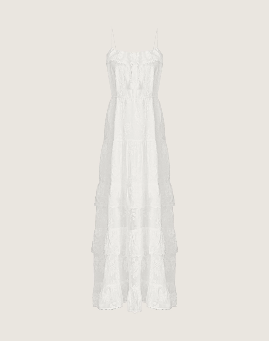 O Vestido Longo Sueli é confeccionado em cambraia bordada. Os detalhes florais bordados reforçam o ar romântico da peça, perfeita para brunchs, casamentos ao ar livre ou encontros especiais.