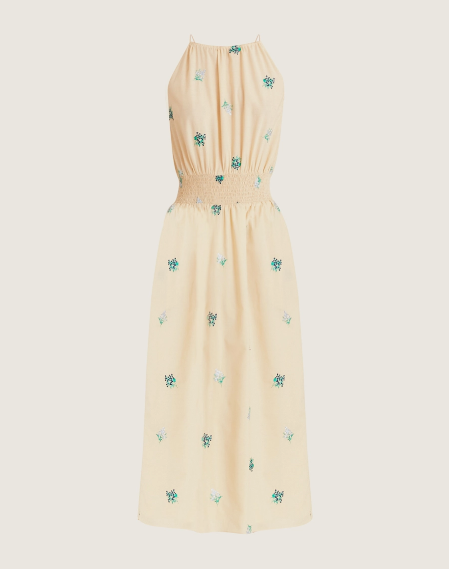 Vestido midi em cambraia bordada com alças finas, amarração nas costas e flores bordadas. Leve, romântico e ideal para dias quentes.