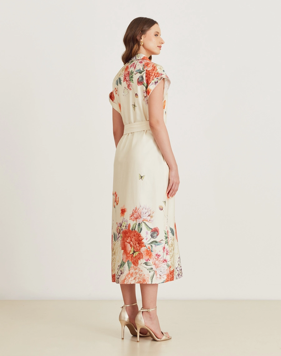 A Chemise Dalila é confeccionada em tricoline estampado. A estampa floral exclusiva Amissima adiciona delicadeza à peça, tornando-a perfeita para ocasiões do dia e da noite. Um look prático, elegante e versátil para qualquer momento. 