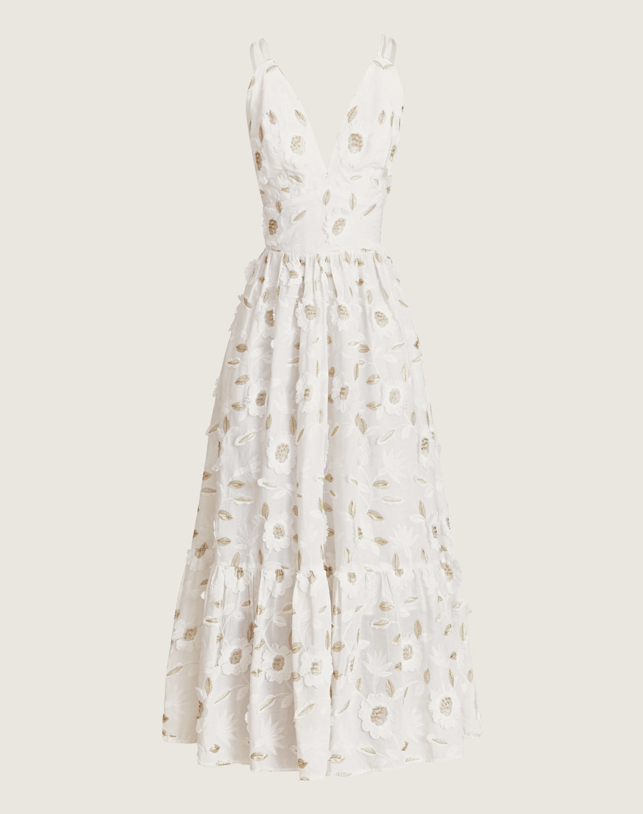 O Vestido Longo Eduarda é confeccionado em cambraia bordada. Os bordados florais tornam esse vestido longo perfeito para quem busca um visual delicado e romântico.
