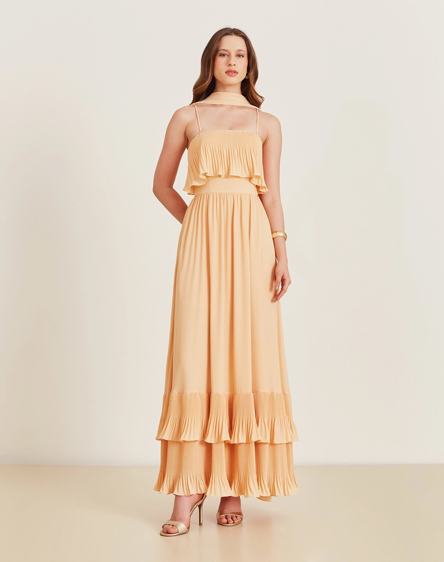O Vestido Longo Nancy com seus babados em plissado é a escolha ideal para ocasiões especiais, unindo conforto e sofisticação em um visual naturalmente encantador!