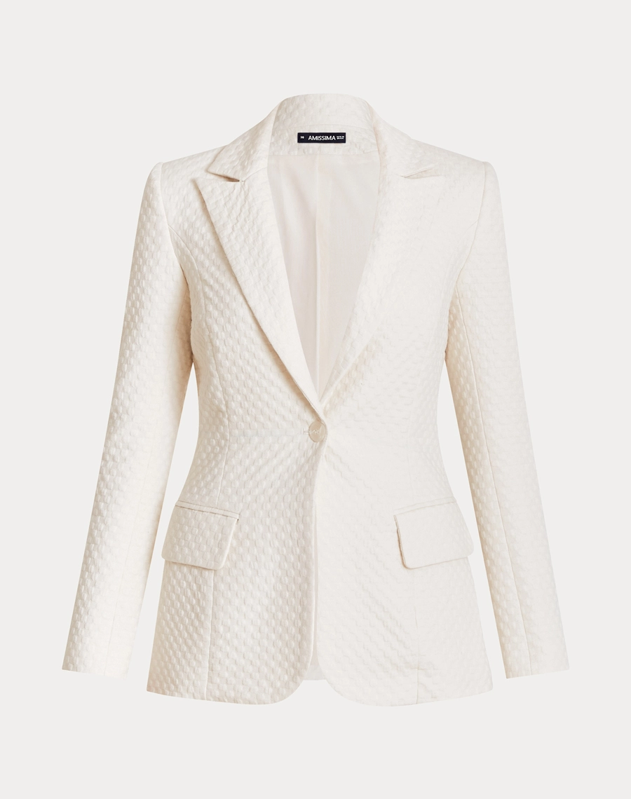 O Blazer Ariadna é confeccionado Jacquard, tecido de alta qualidade, com textura em relevo e desenho sofisticado que valoriza a peça com um visual elegante e refinado.