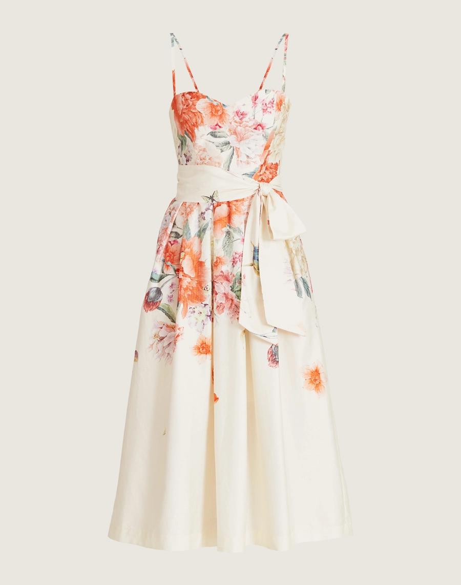 O Vestido Midi Sofia é confeccionado em tricoline estampado. Ideal para brunchs, batizados, casamentos diurnos ou festas ao ar livre.