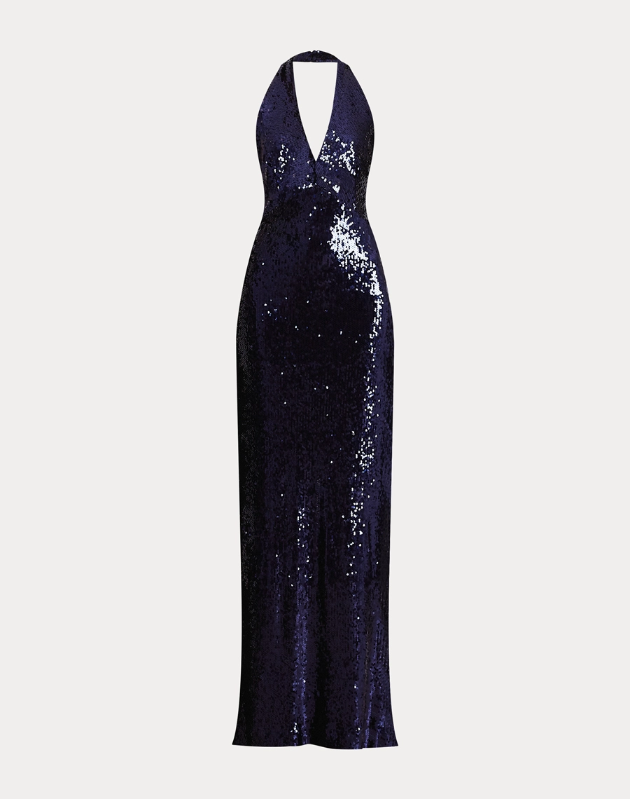 O Vestido Longo Ada é confeccionado em tecido de paetê de alta qualidade, possui brilho intenso e acabamento sofisticado, criando um efeito luminoso que valoriza a peça em todos os ângulos.