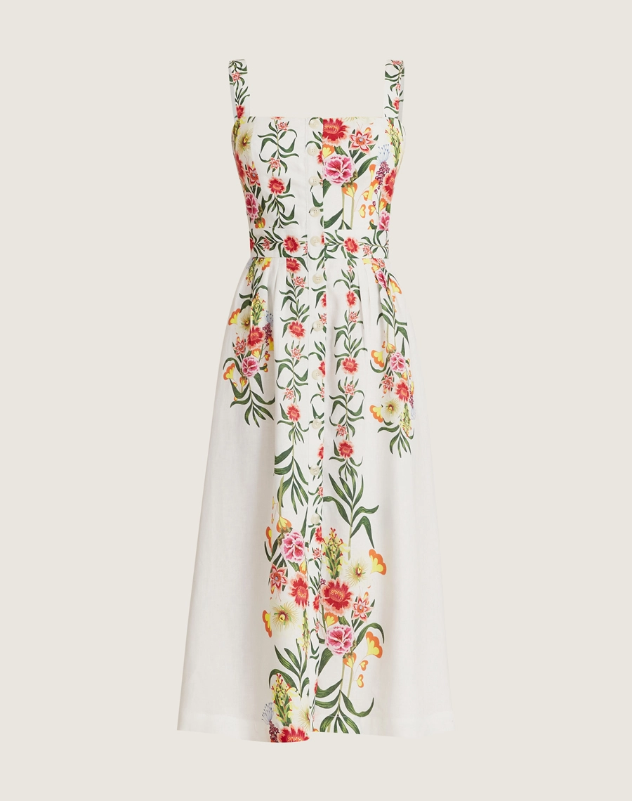 O Vestido Midi Elida é confeccionado em linho estampado garantindo leveza e frescor nos dias mais quentes.
