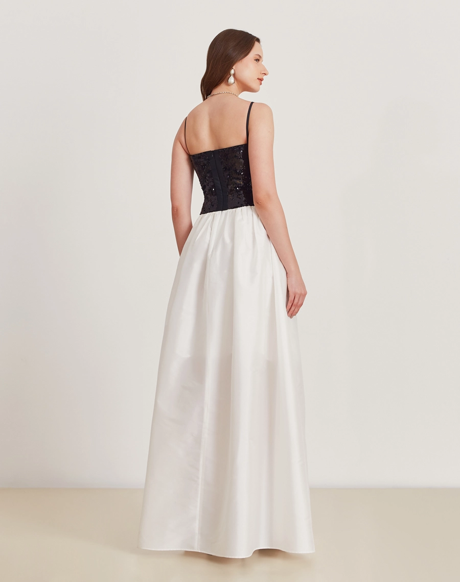 O Vestido Longo Betty é confeccionado em tafetá e paetê. É a escolha perfeita para eventos de gala, formaturas ou ocasiões que pedem um look de impacto.