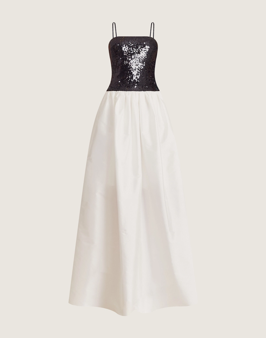 O Vestido Longo Betty é confeccionado em tafetá e paetê. É a escolha perfeita para eventos de gala, formaturas ou ocasiões que pedem um look de impacto.