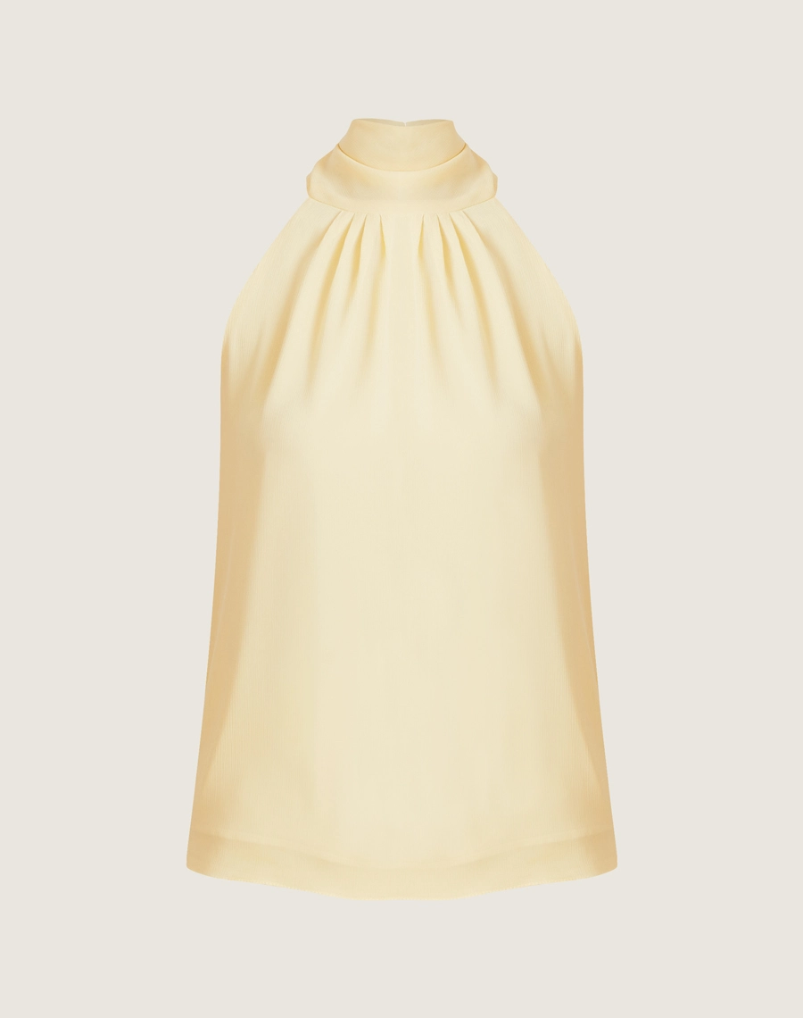 A Blusa Ophelia é confeccionada em Chiffon Youro.  Perfeita para diversas ocasiões, se encaixa tanto em eventos ao ar livre, como em jantares especiais.