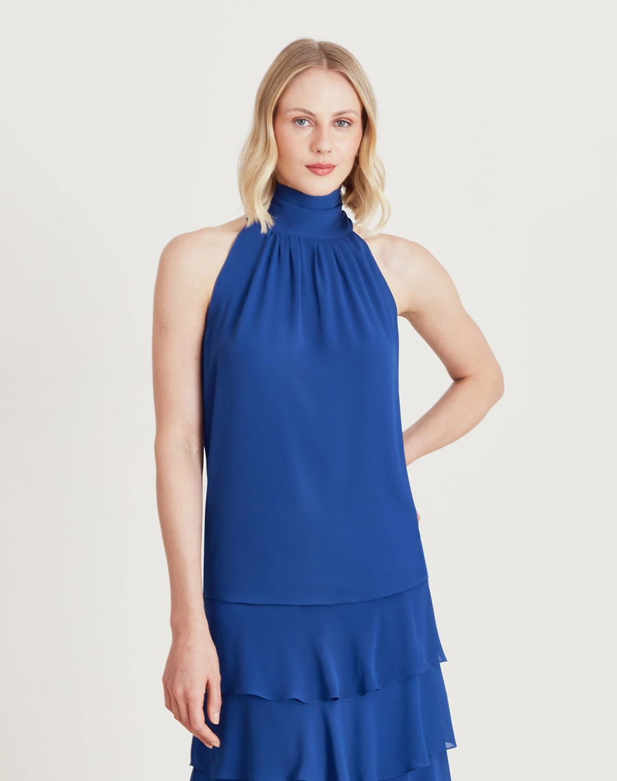 A Blusa Ophelia é confeccionada em Chiffon Youro.  Perfeita para diversas ocasiões, se encaixa tanto em eventos ao ar livre, como em jantares especiais.