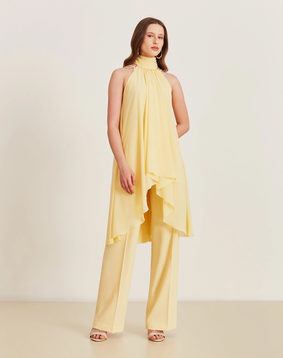 A Blusa Juliete é confeccionada Youro tingido, um tecido que oferece um caimento leve e fluido, ideal para quem busca conforto e elegância. <br/>