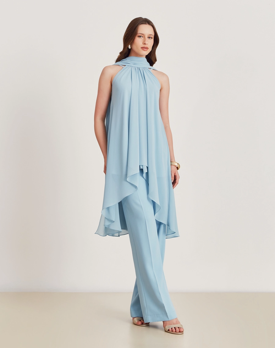 A Blusa Juliete é confeccionada Youro tingido, um tecido que oferece um caimento leve e fluido, ideal para quem busca conforto e elegância. <br/>