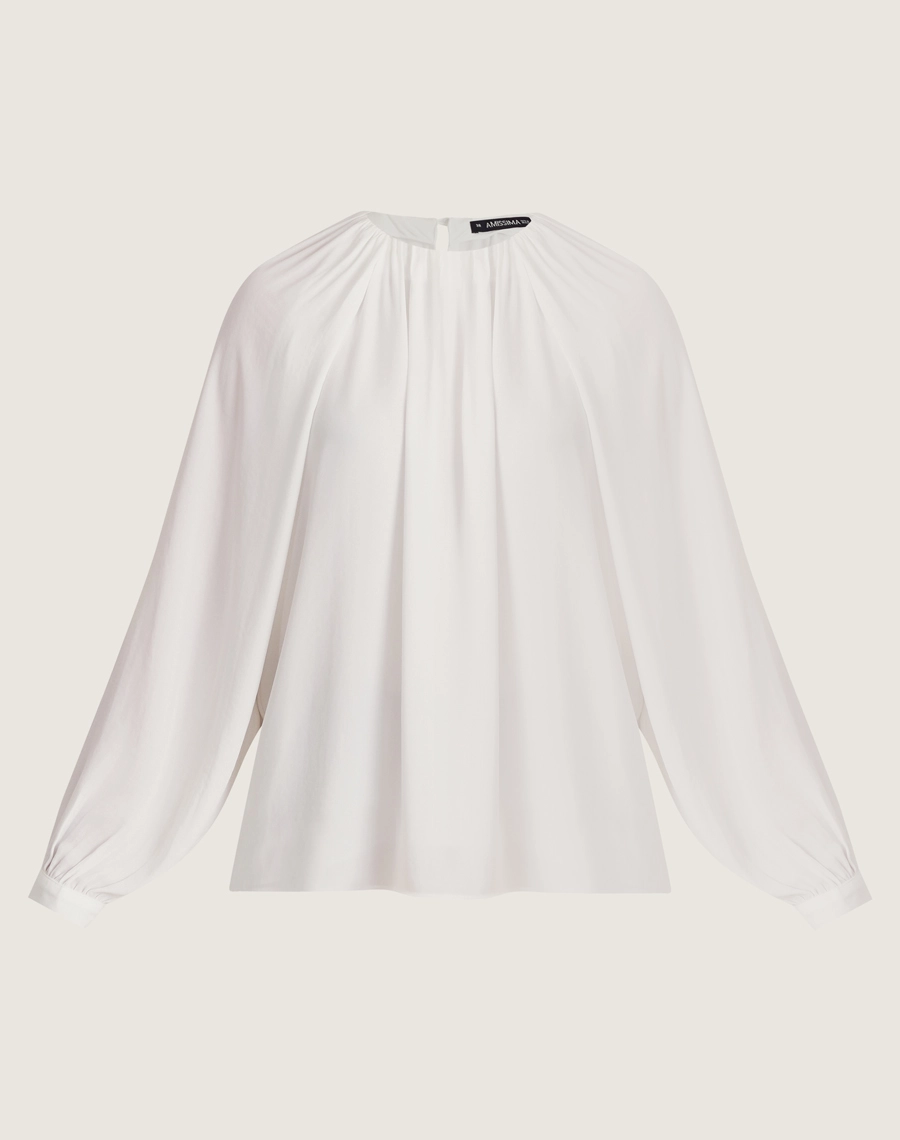 A Blusa Odete é confeccionada em crepinho. Transita facilmente entre reuniões de trabalho e eventos sociais, do dia à noite. 