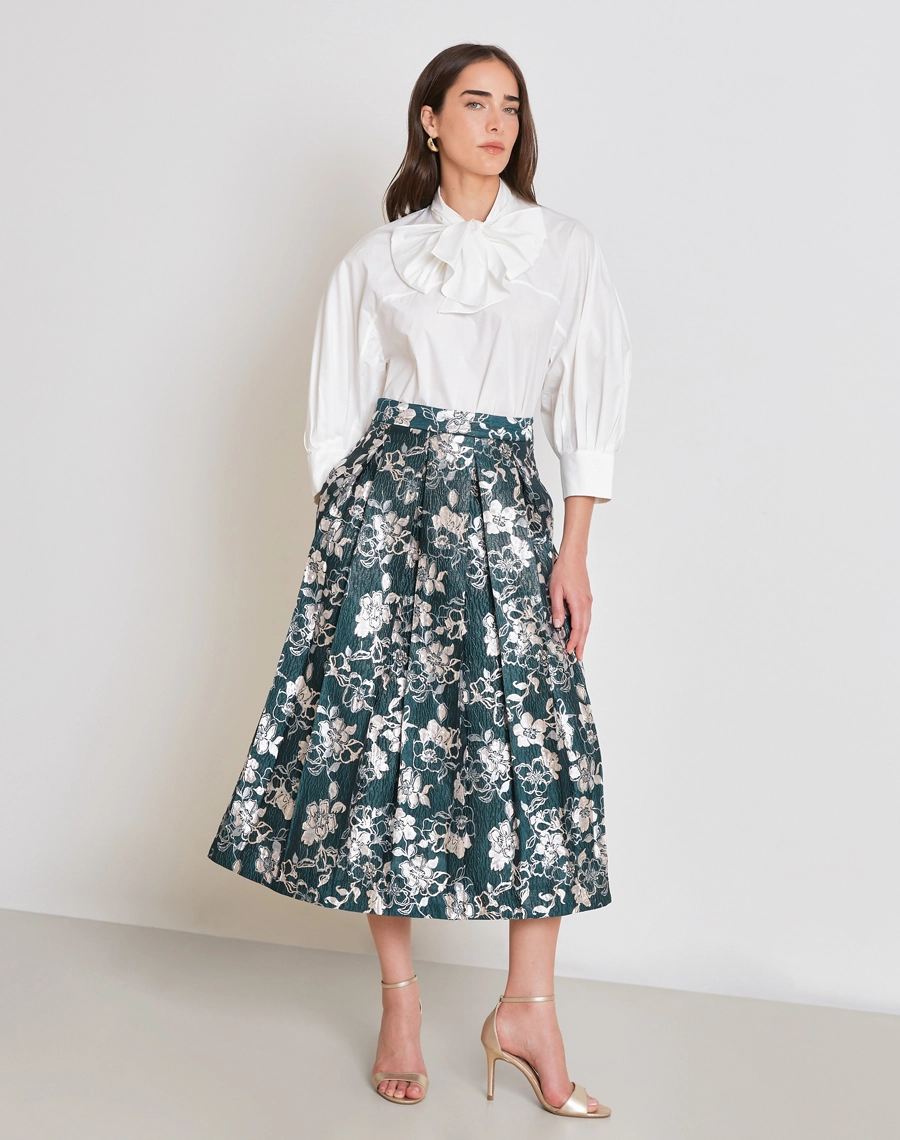 A Blusa Gianna é confeccionada em Cotton Paper. Versátil, pode ser combinada em looks que transitam facilmente entre o dia e a noite, oferecendo praticidade e estilo.