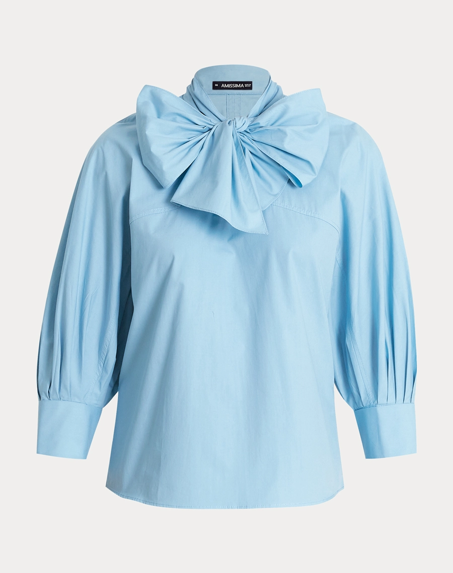 A Blusa Gianna é confeccionada em Cotton Paper. Versátil, pode ser combinada em looks que transitam facilmente entre o dia e a noite, oferecendo praticidade e estilo.