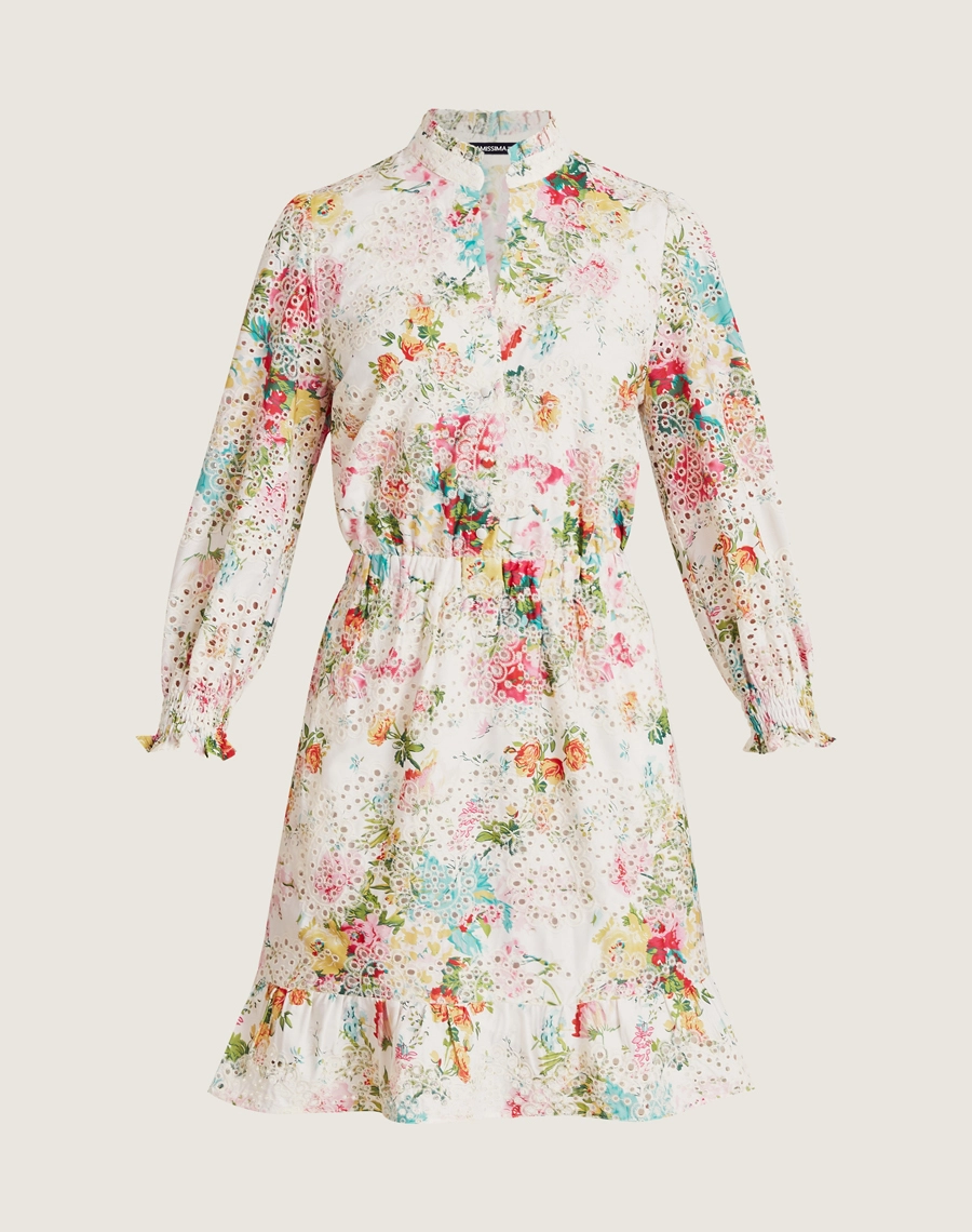 O Vestido Curto Melis confeccionado em laise, um tecido leve e fluido, ideal para dias quentes.