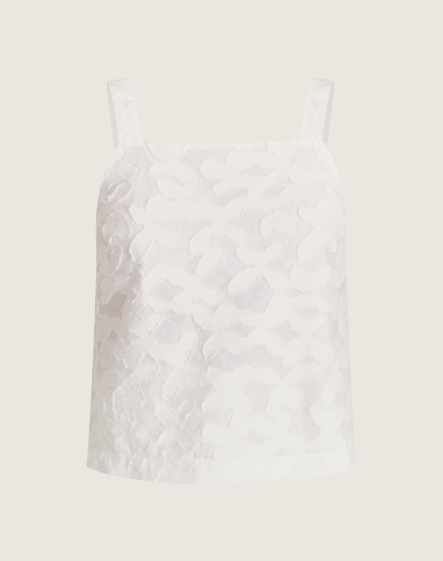 Top Amira é confeccionado em cambraia bordada com textura floral em alto-relevo que traz delicadeza e sofisticação.