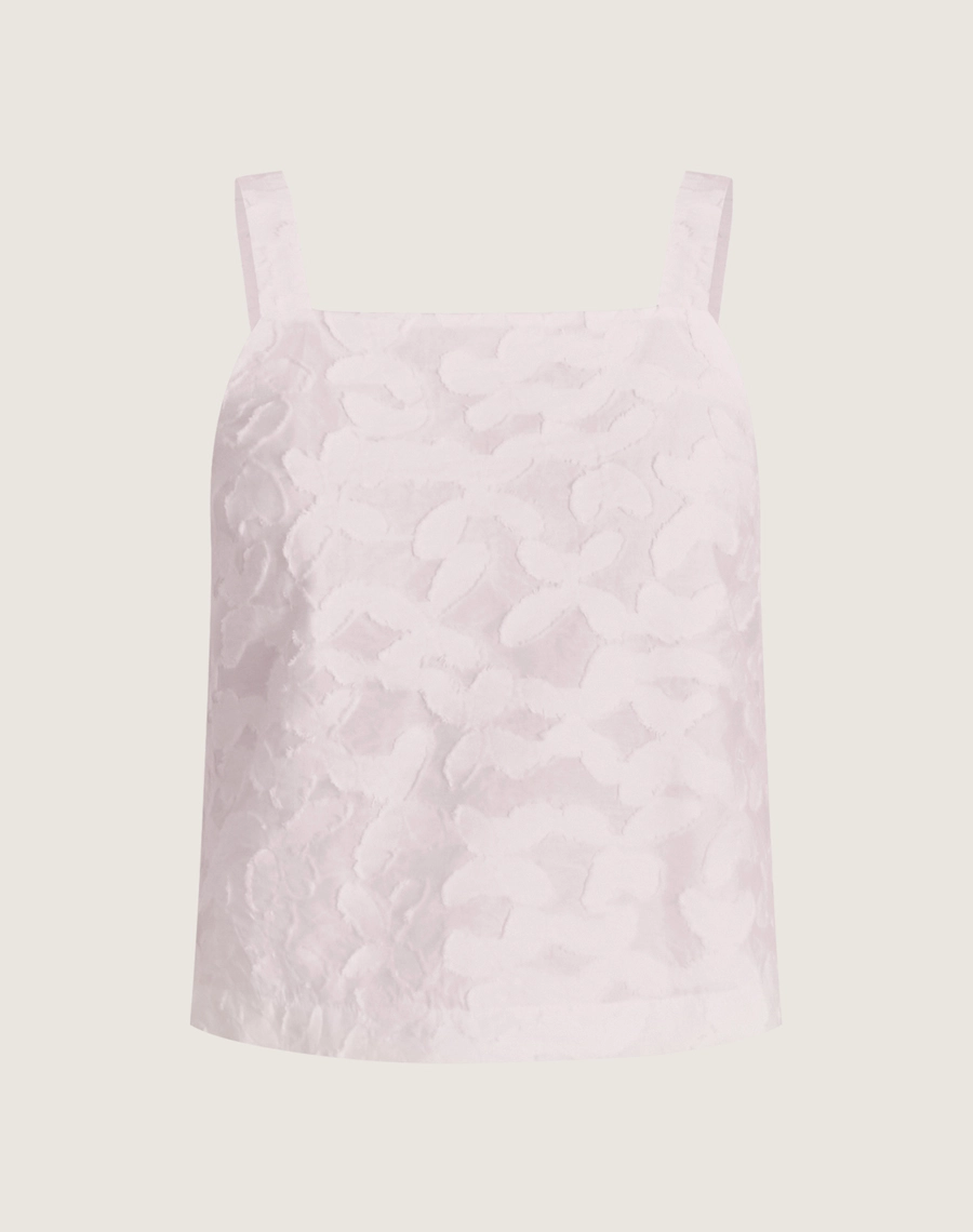 Top Amira é confeccionado em cambraia bordada com textura floral em alto-relevo que traz delicadeza e sofisticação.