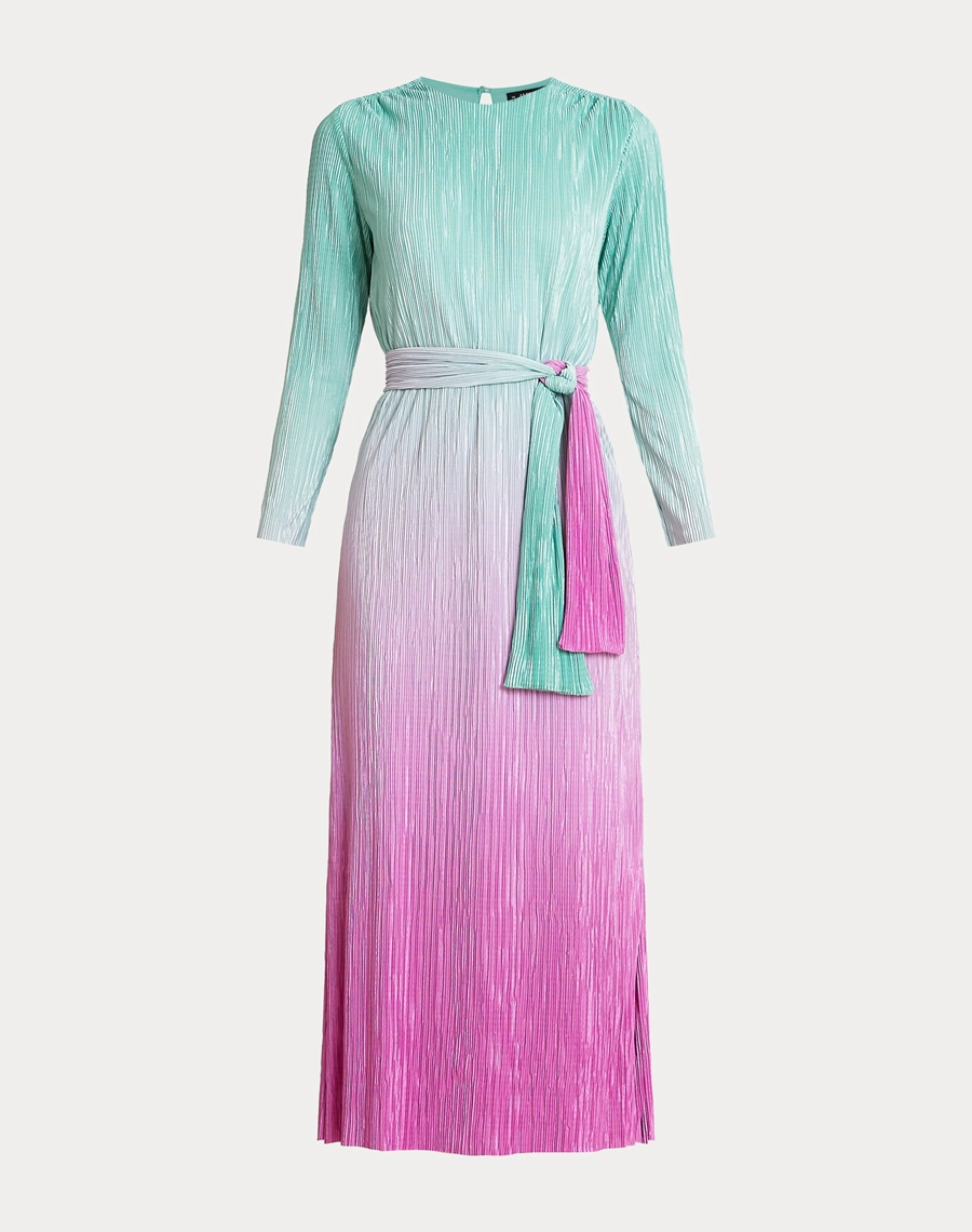 O Vestido Midi Lana é confeccionado em malha plissada, tecido com toque macio e leve elasticidade.
