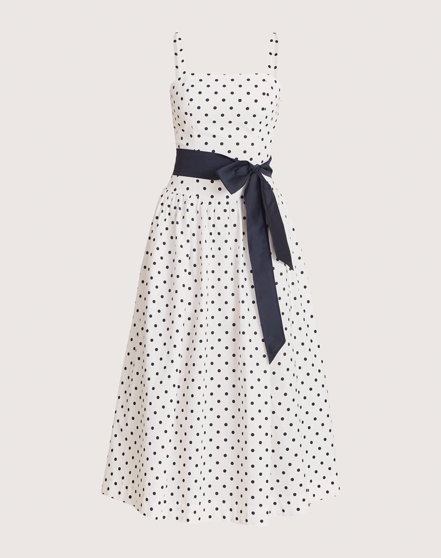 Vestido Midi Poppi confeccionado em tricoline, tecido leve, fresco e estruturado, com toque macio e estampa clássica de poá.