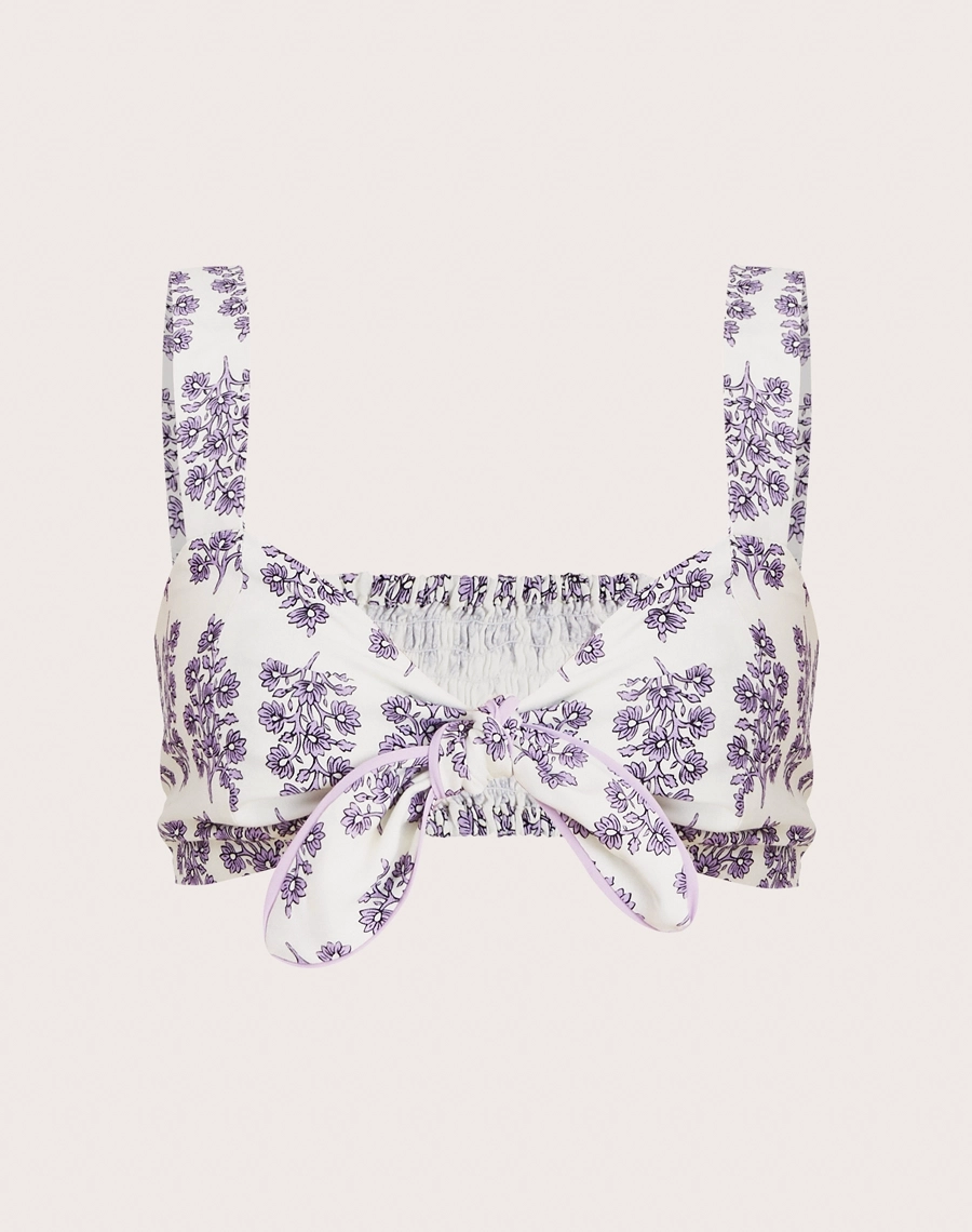 Top Lilac confeccionado em viscose estampada, tecido leve, fluido e confortável, conhecido pelo toque macio e caimento solto.