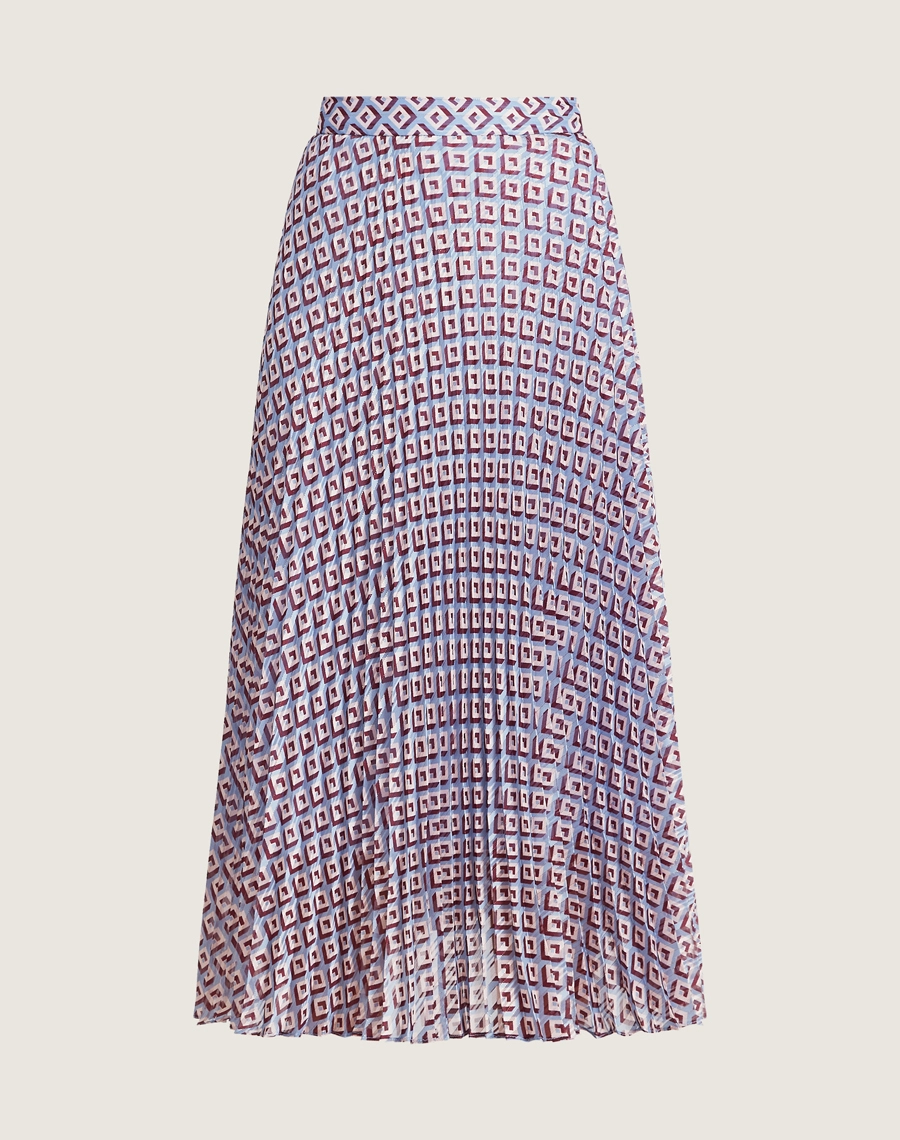 A Saia Plissada Eli é confeccionado em Chiffon Maquinetado, tecido leve, fluido e translúcido, com textura sutil em relevo criada pelo processo de maquineta, que acrescenta sofisticação e profundidade ao visual.
