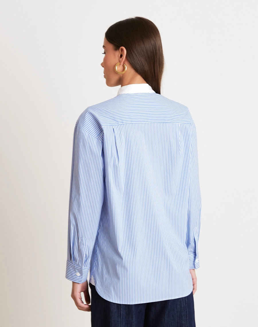 A Camisa Eudora é confeccionada em alfaiataria, tecido que proporciona elegância e sofisticação, mantendo conforto e excelente acabamento, ideal para produções refinadas e modernas.