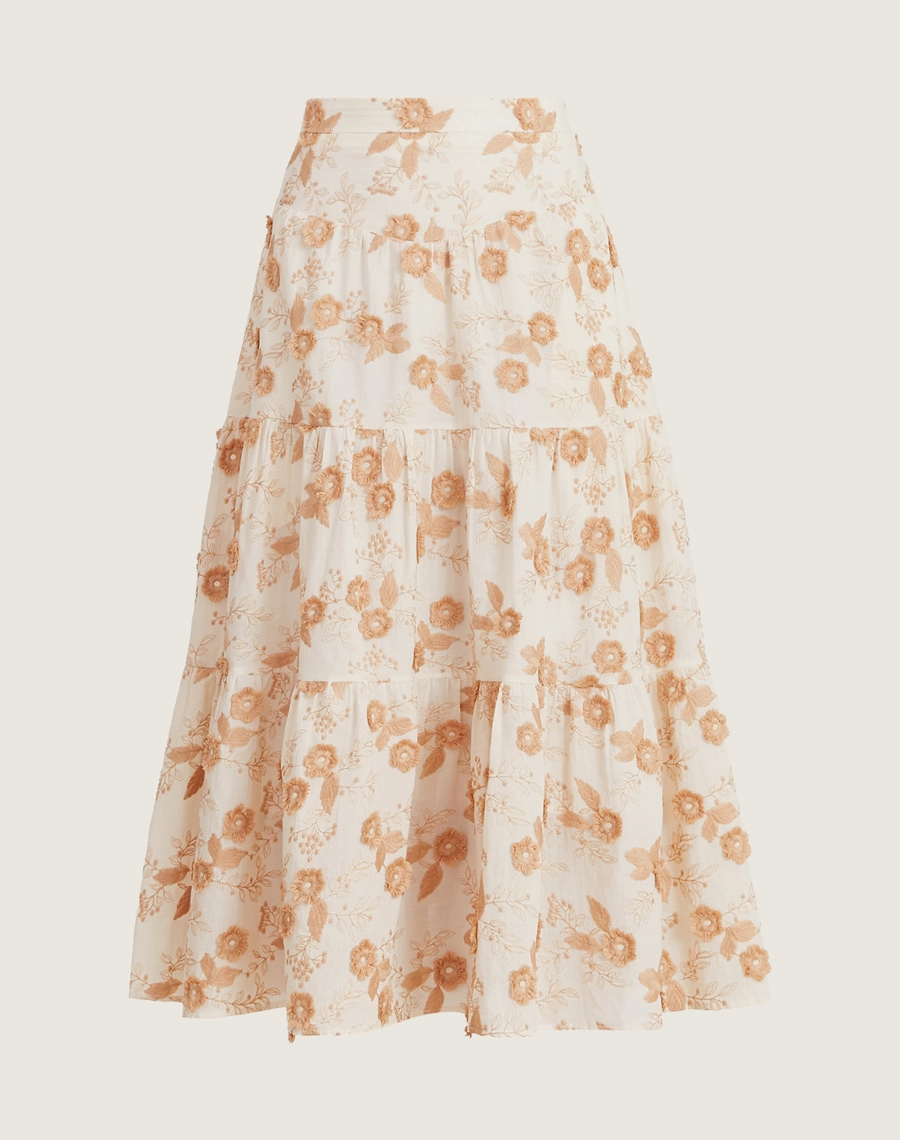 Saia Vivian confeccionada em cambraia bordada, o tecido se destaca pela delicadeza do bordado floral, que acrescenta charme, feminilidade e um visual artesanal sofisticado, mantendo conforto e excelente respirabilidade.
