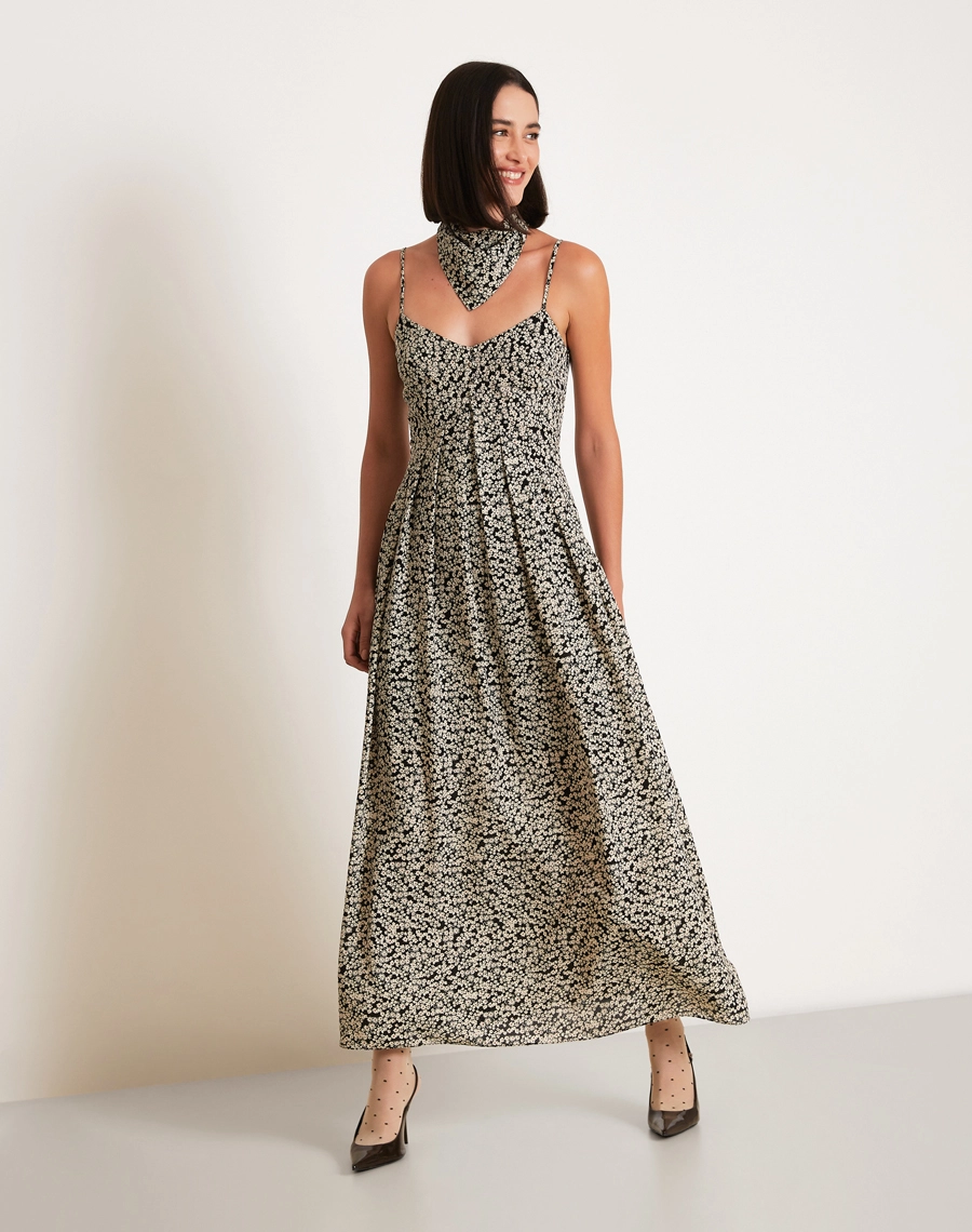 O Vestido Longo Elliana é confeccionado em crepinho estampado, um tecido leve, de toque suave e com textura levemente creponada, que proporciona ótimo caimento e movimento natural à peça.