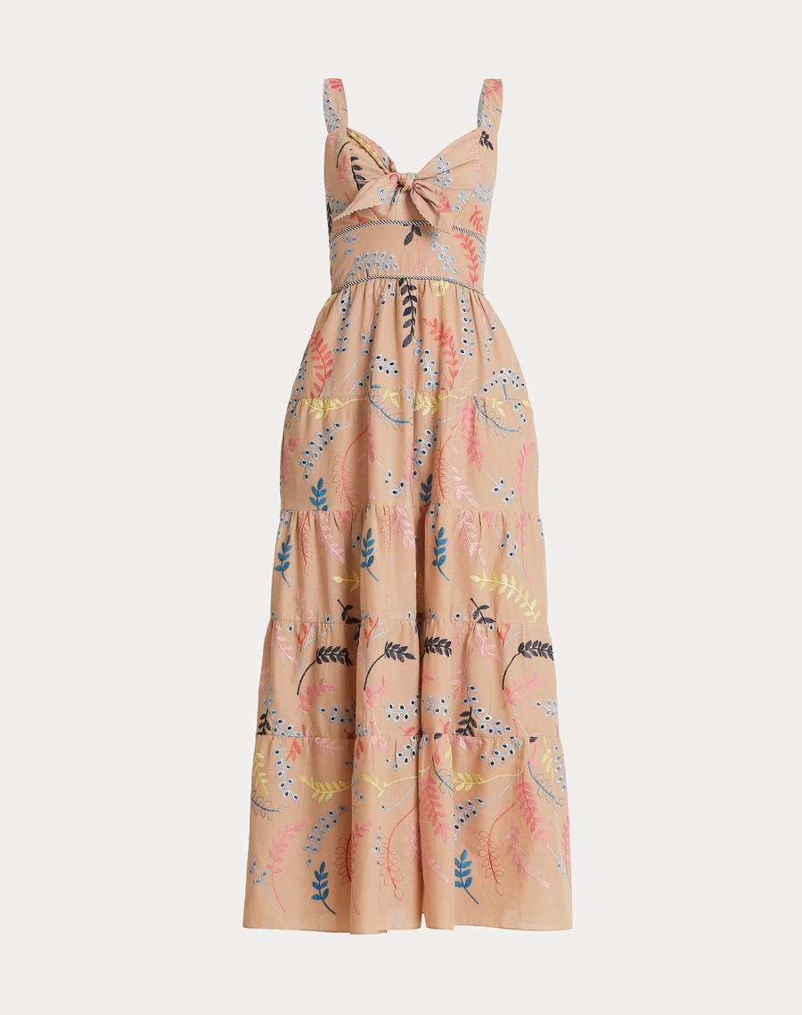 O Vestido Longo Marcy é confeccionado em laise bordada, um tecido leve, conhecido pelo seu visual delicado e elegante. 