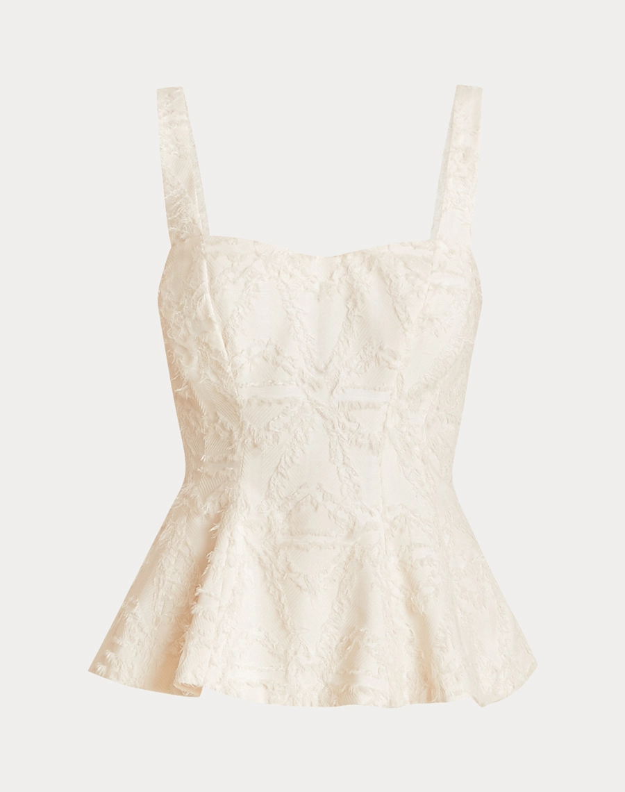 O Top Talia é confeccionado em Jacquard, tecido com textura rica e relevo marcante, que traz sofisticação e um visual moderno à peça. 