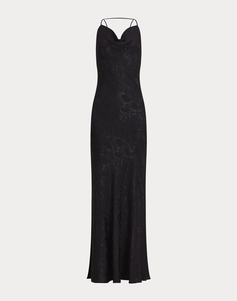 O Vestido Longo Judith é confeccionado em viscose Jacquard, um tecido leve, macio e com textura sofisticada em relevo que traz elegância sem perder o conforto. 