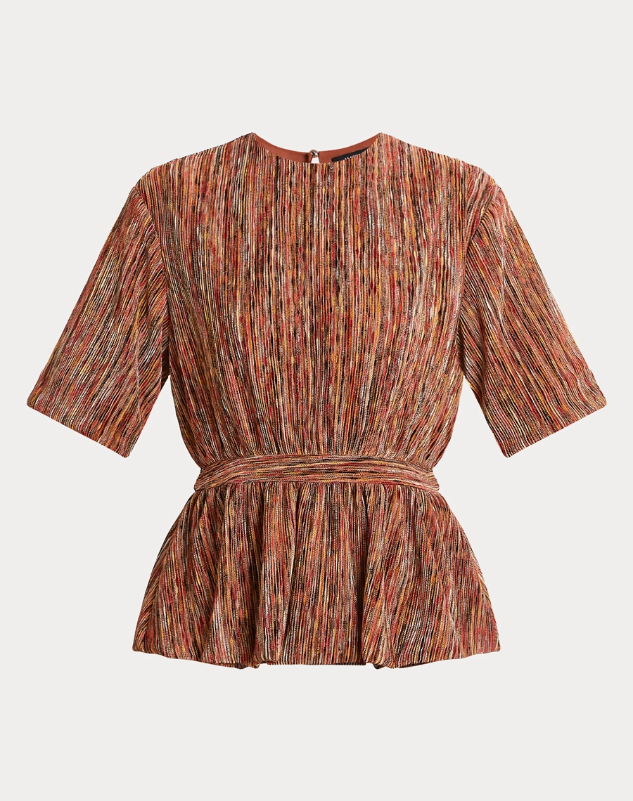 A Blusa Bianca é confeccionada em malha plissada, tecido de toque macio e caimento fluido que se destaca pela textura sofisticada dos plissados, proporcionando movimento, conforto e elegância.