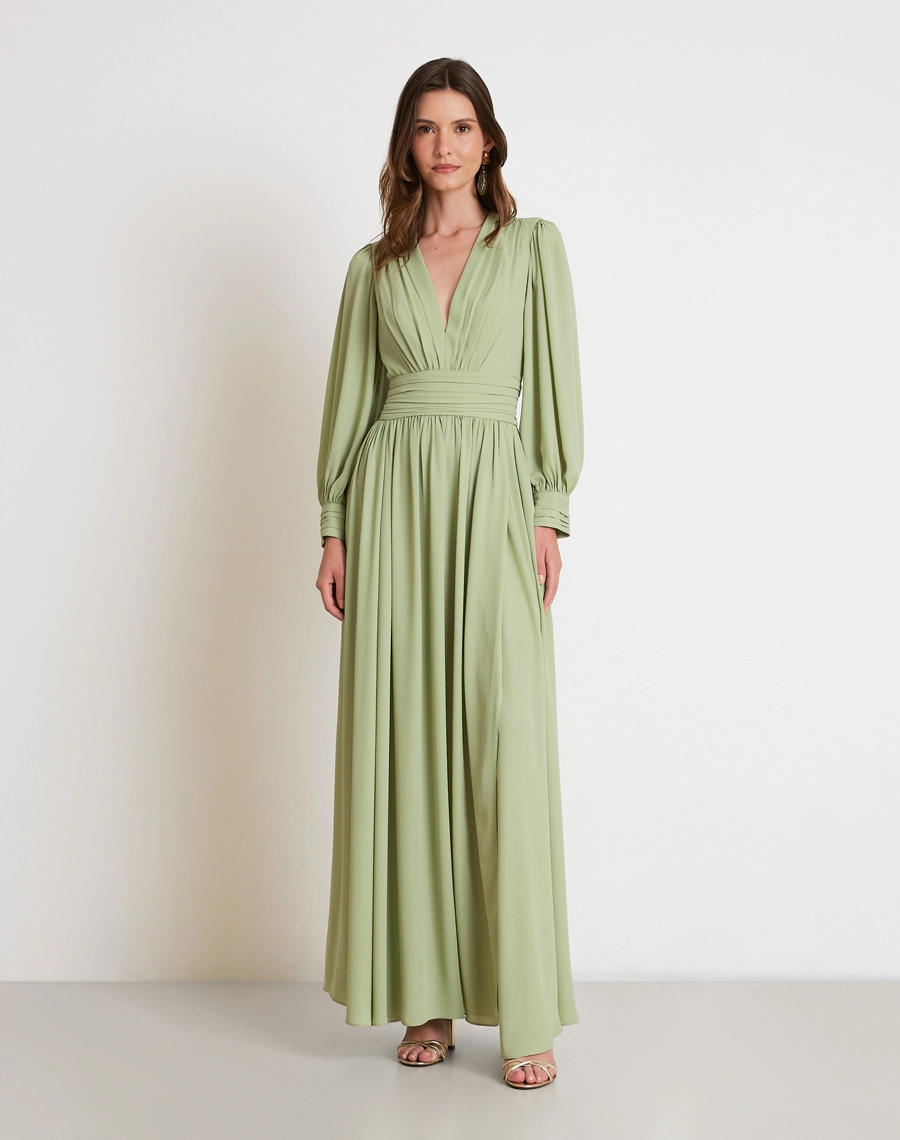 O Vestido Longo Esmeralda é confeccionado em crepinho, tecido de toque macio, caimento leve e fluido, proporcionando elegância e conforto.