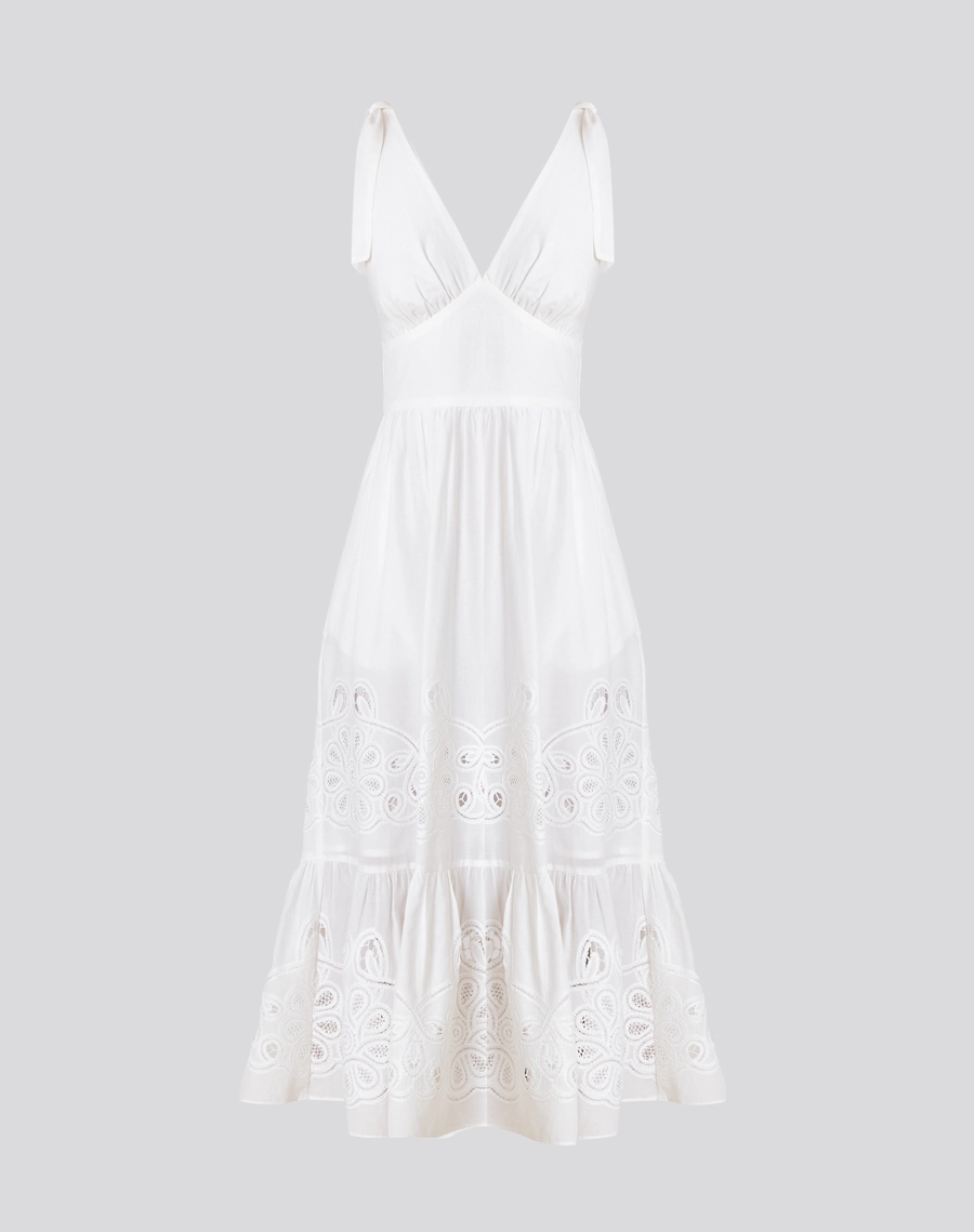 O Vestido Midi Silvana é confeccionado em cambraia bordada, tecido leve e delicado, com desenhos vazados que conferem charme artesanal e um toque romântico à peça. <br/>