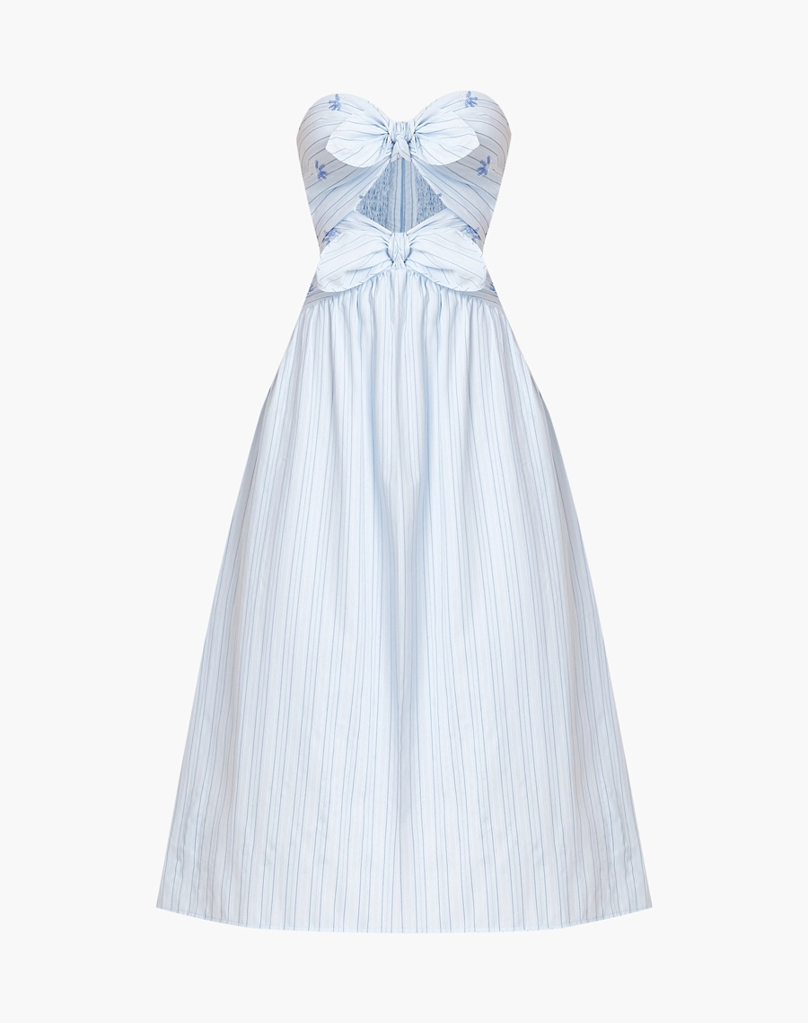 O Vestido Midi Sicilia é confeccionado em tricoline listrada, com proposta feminina e delicada.
