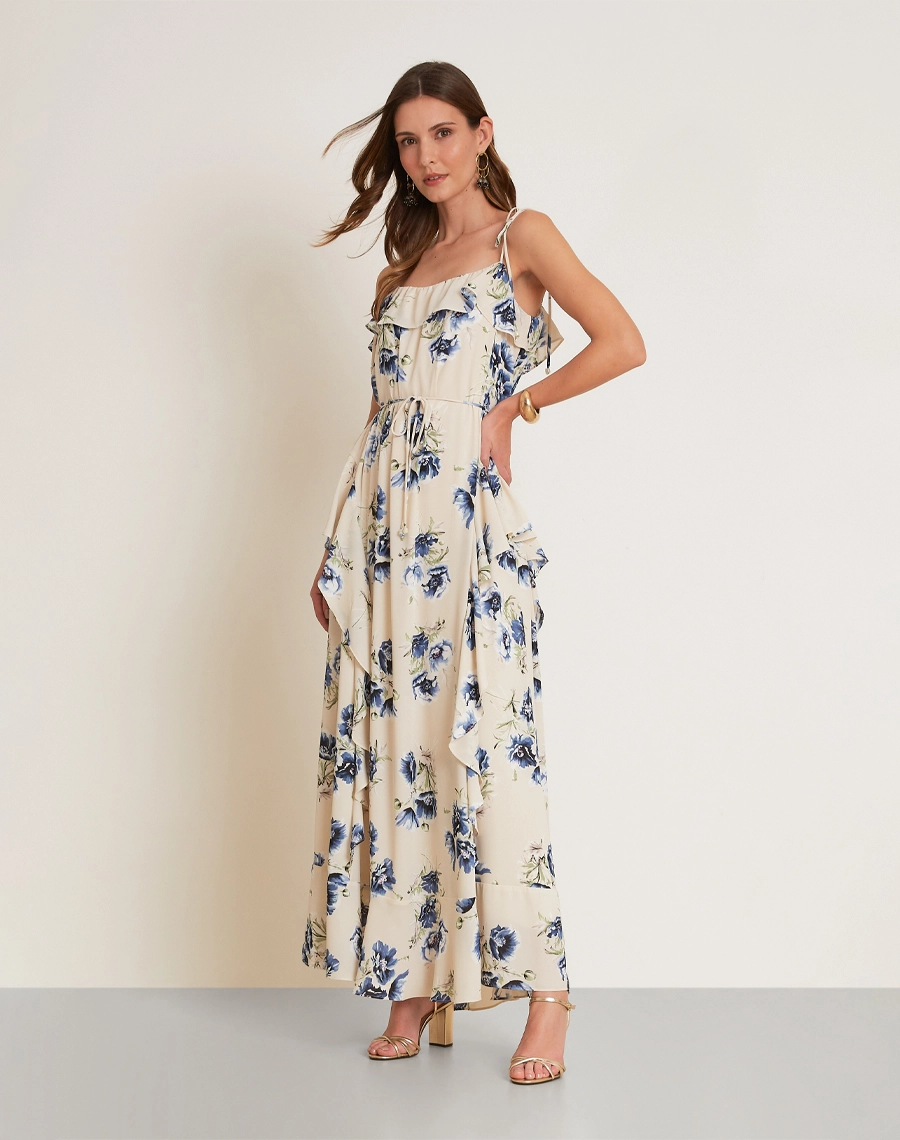 O Vestido Longo Dalia Blue é confeccionado em crepinho, tecido de textura delicada e caimento fluido, proporcionando leveza, movimento e um visual sofisticado. <br/>